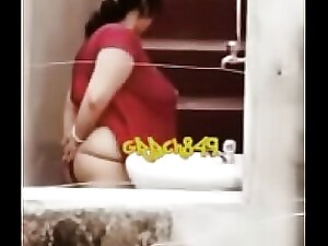Desi aunty caught peeing by spy cam